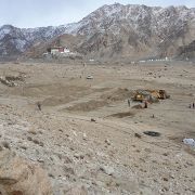 Ice Stupa and a baby stupa in the making on the deserts of Phyang. Volunteers and machines are preparing plantation-ready trenches for the 5,000 tree mega plantation event on 5th of March... under the Go Green Go Organic Campaign.